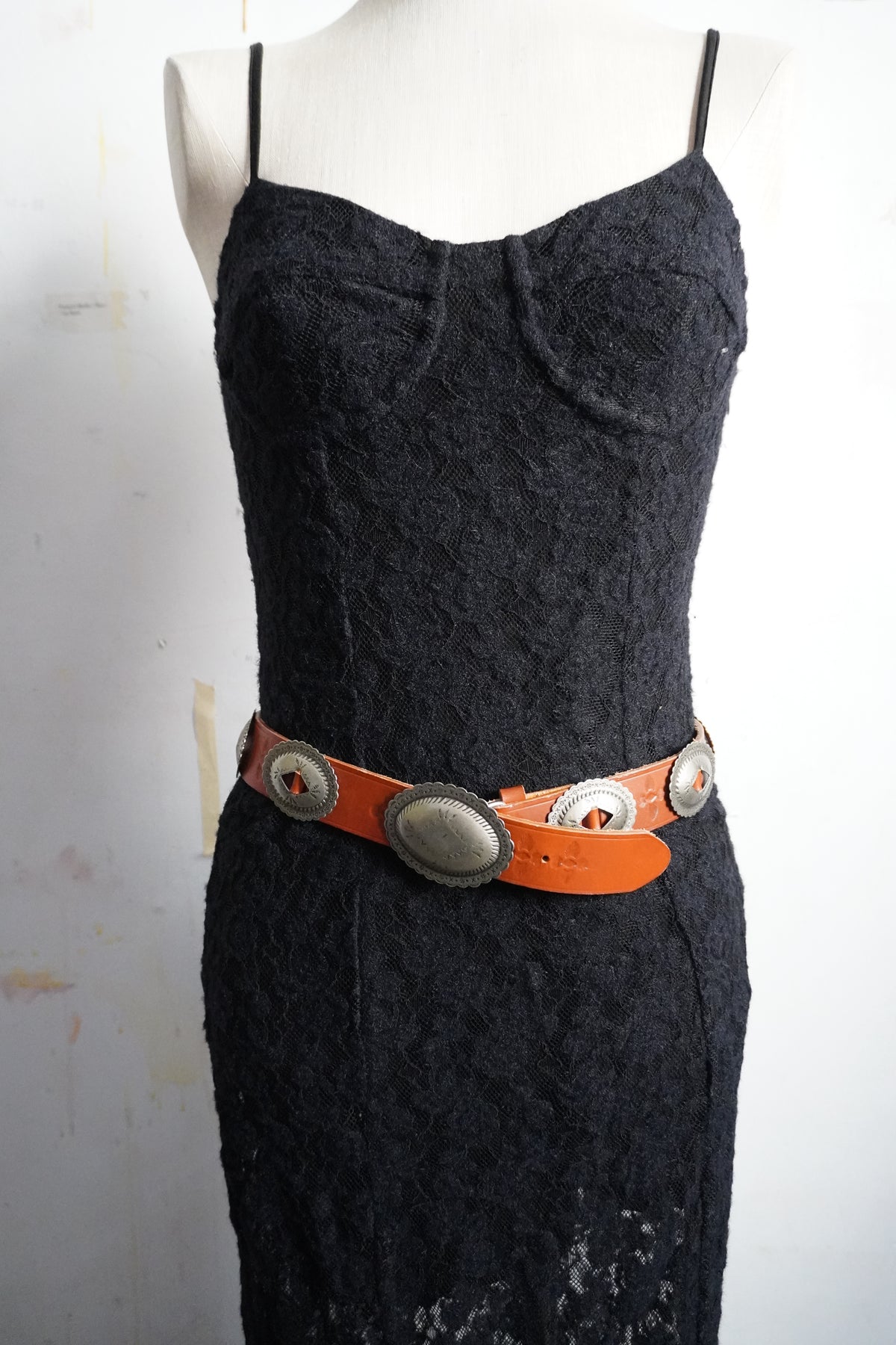 Stamped Pewter Conchos on Belt Strap