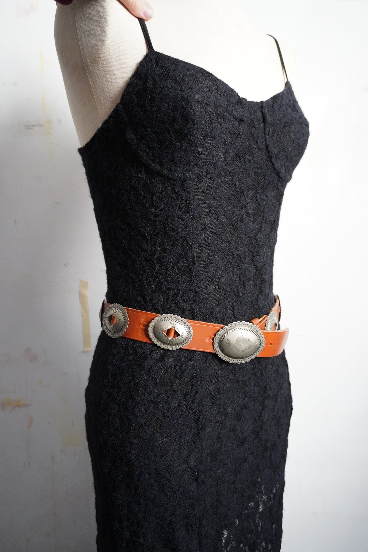Stamped Pewter Conchos on Belt Strap