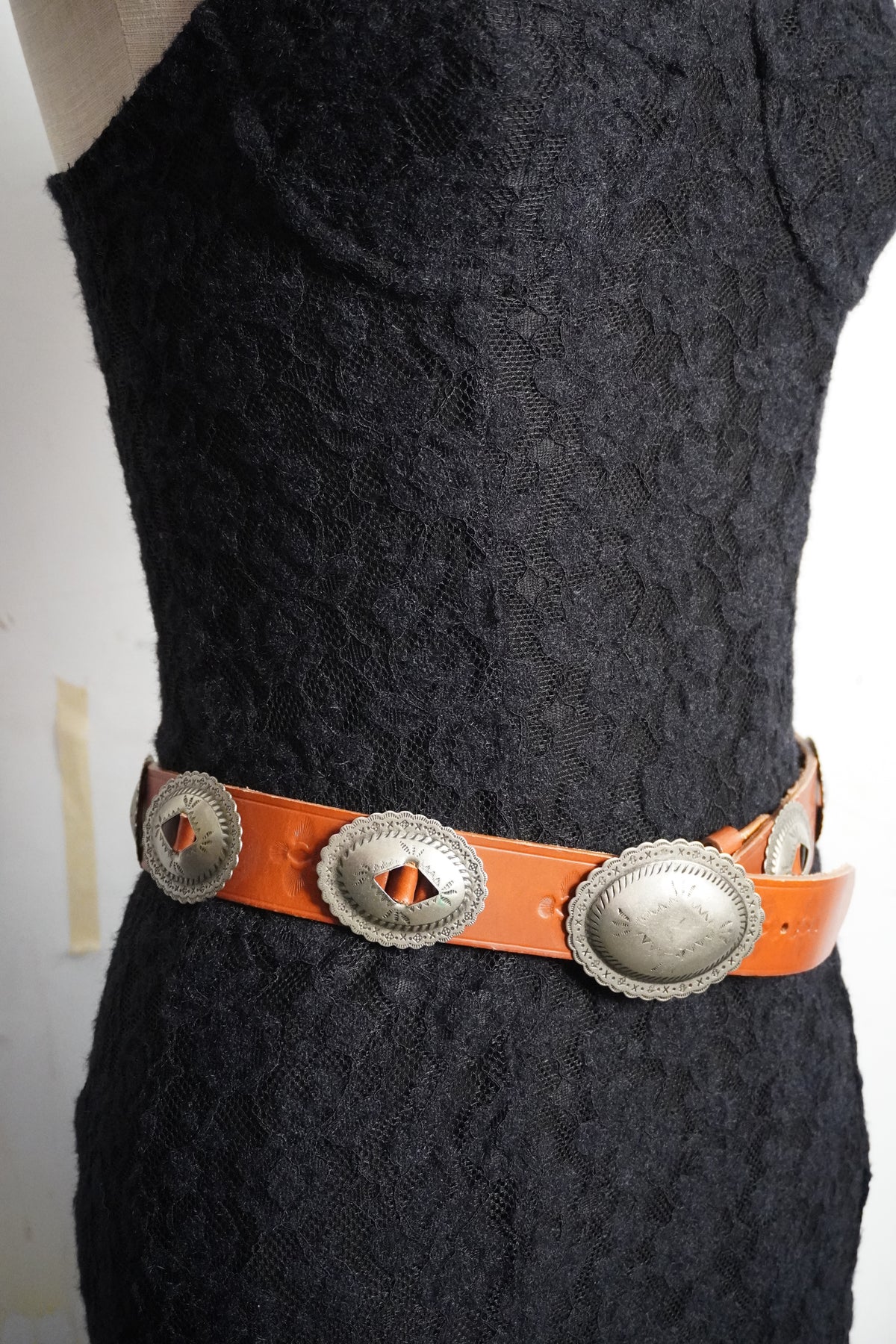 Stamped Pewter Conchos on Belt Strap