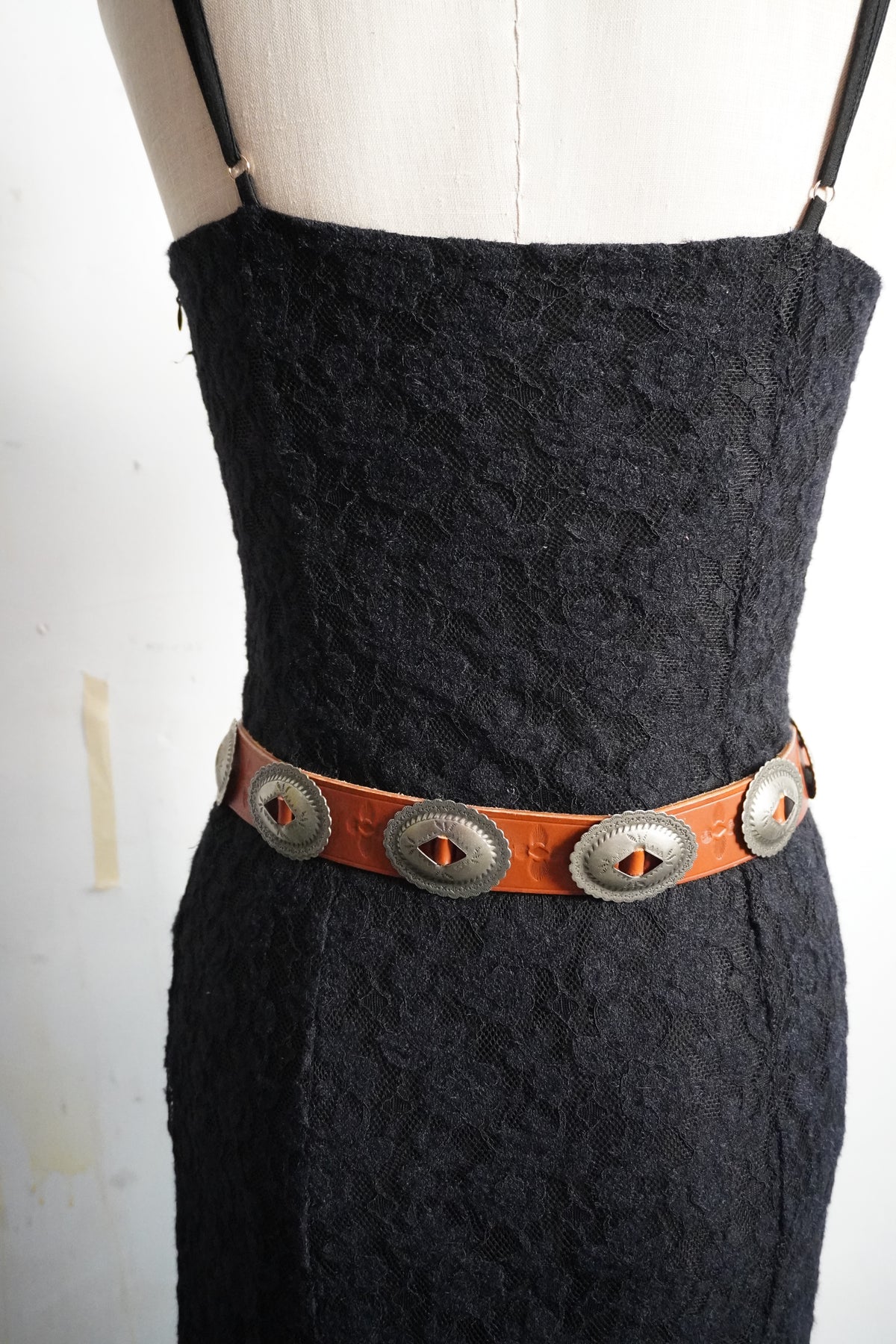 Stamped Pewter Conchos on Belt Strap