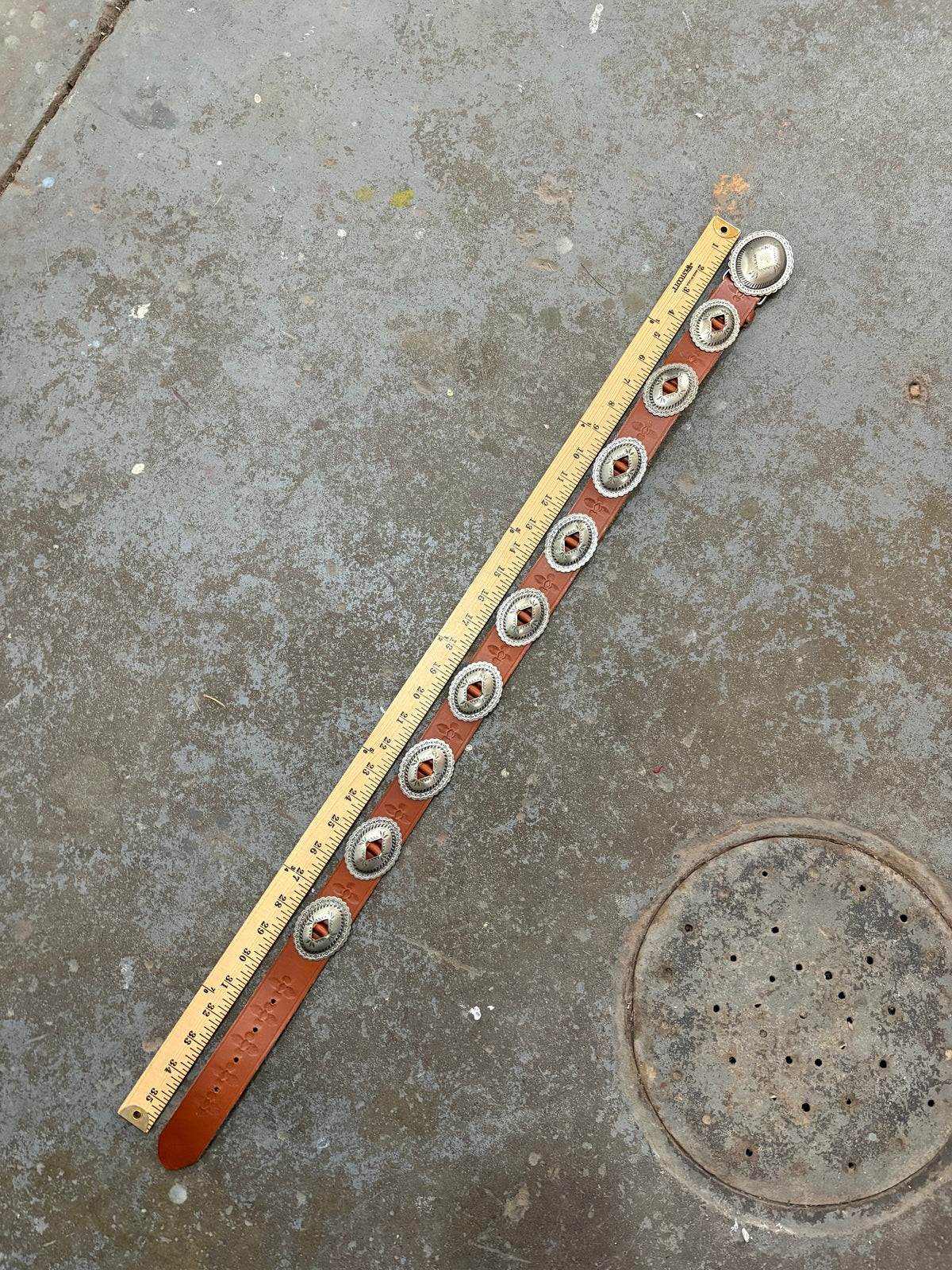 Stamped Pewter Conchos on Belt Strap